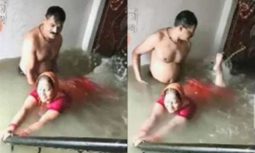 Flood in Prayagraj, husband becomes trainer ... This video of husband and wife is getting viral!