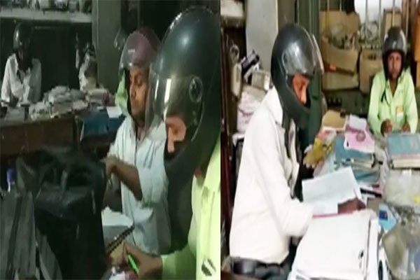 Employees wear helmets to work in UP government office, photos go viral on social media