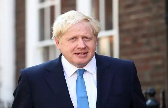 British Prime Minister apologizes for mocking Covid, advisor resigns कोविड का मजाब
